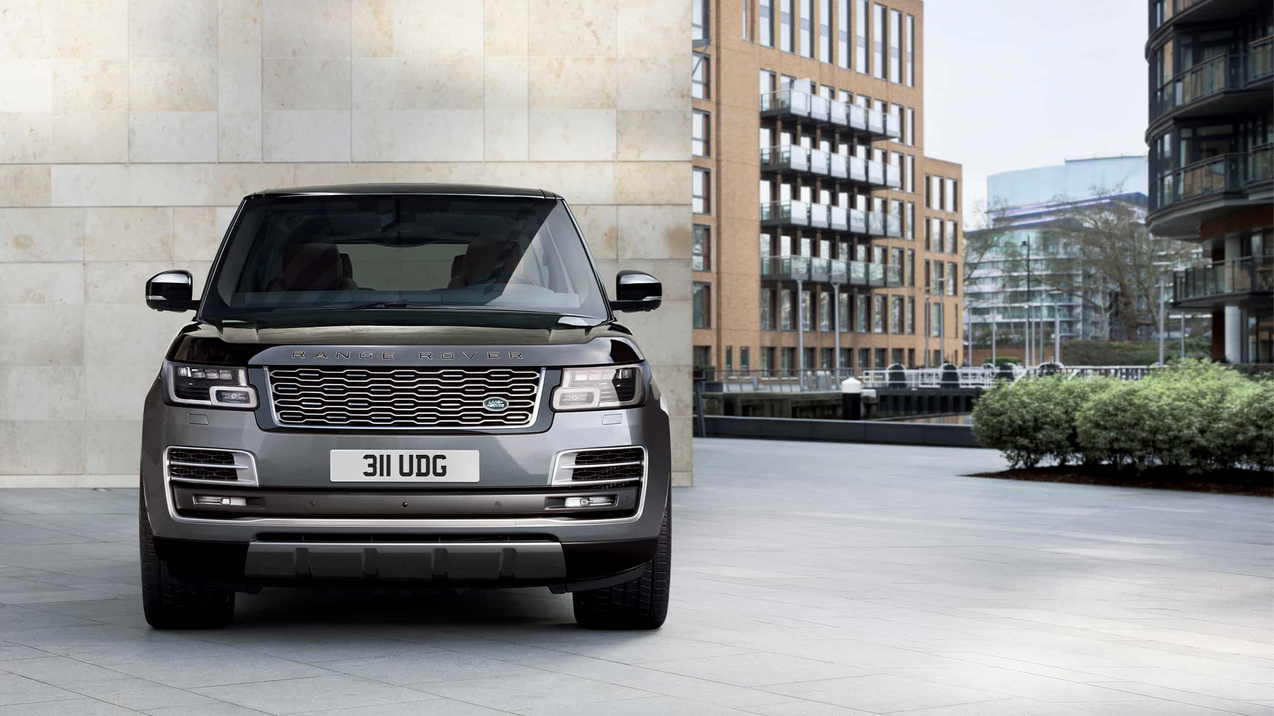 Range Rover traveling on city road