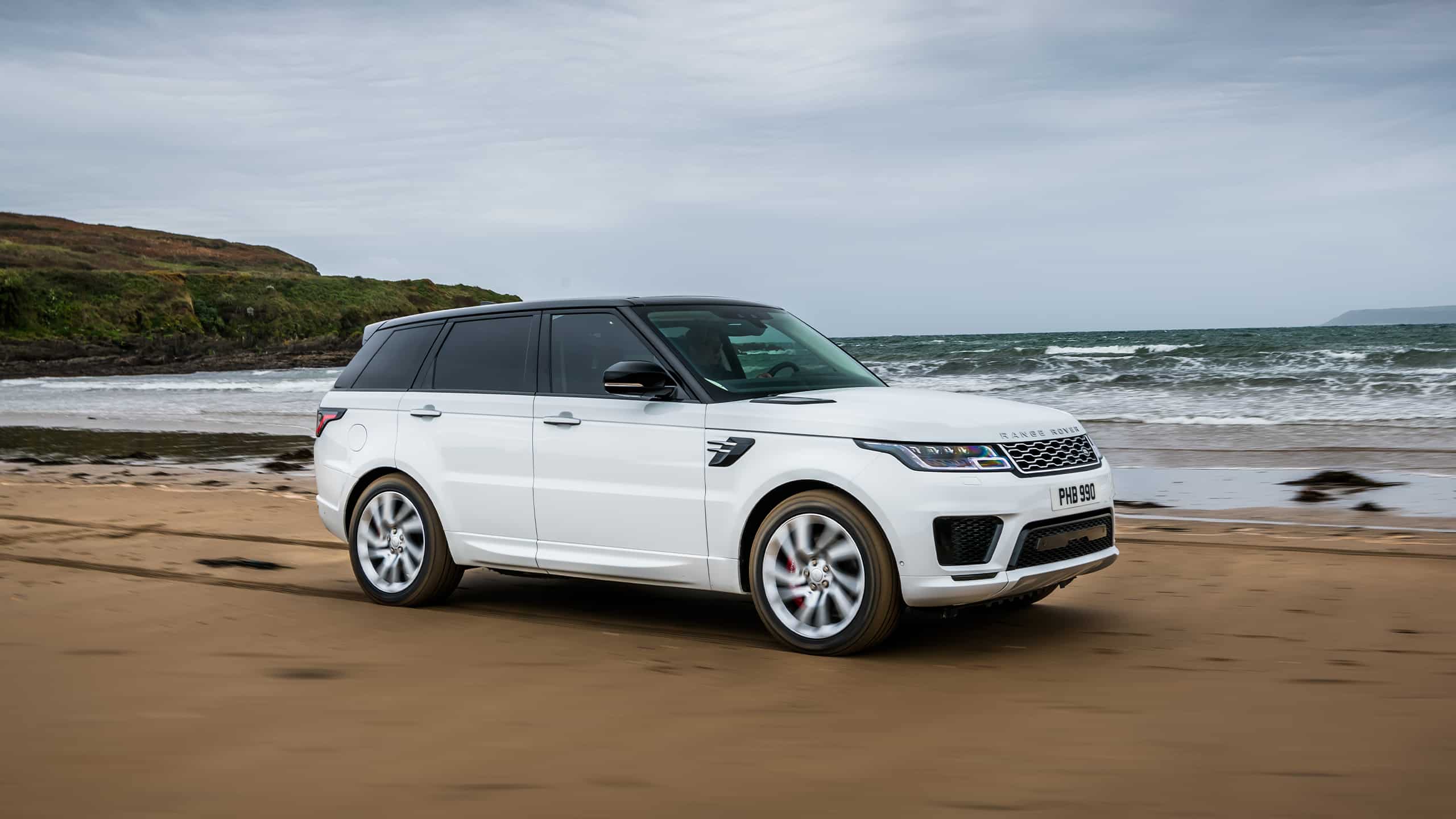 Parked Range Rover Sport  on off-road at Beach Side
