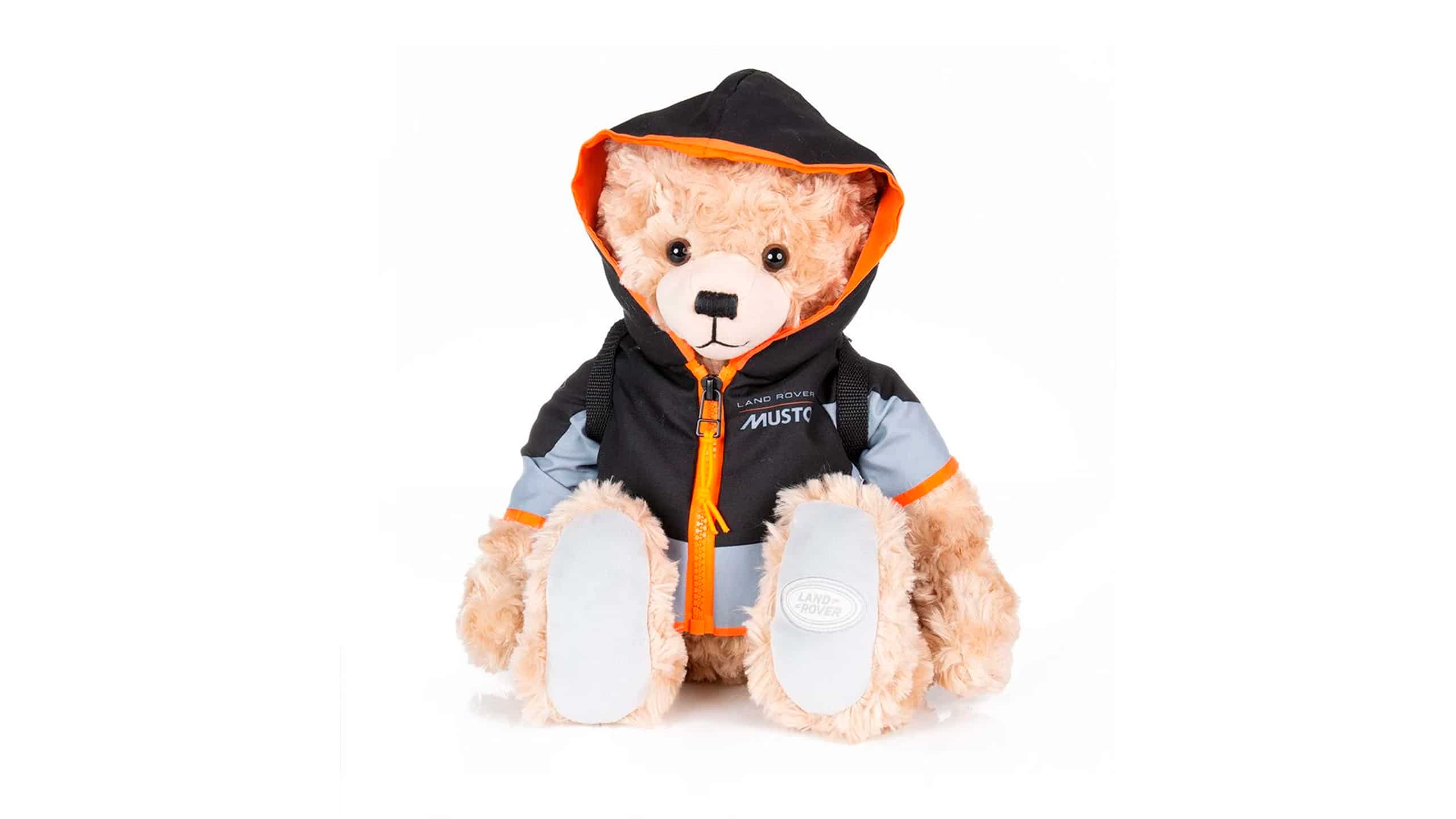 The perfect companion for little adventures. This soft-touch Adventure Bear. Wears a removable replica Land Rover x Musto jacket and removable waterproof style backpack with working zipper for extra fun.