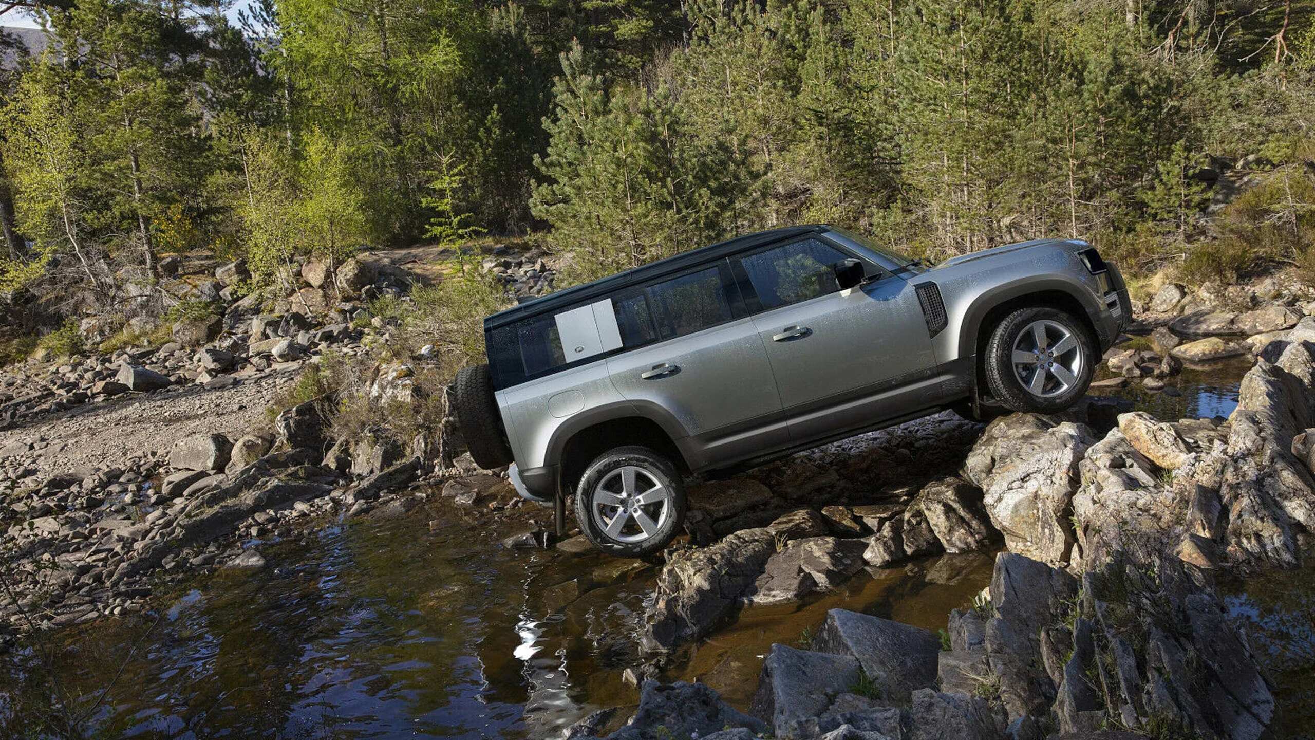 Car up climbing on river off road